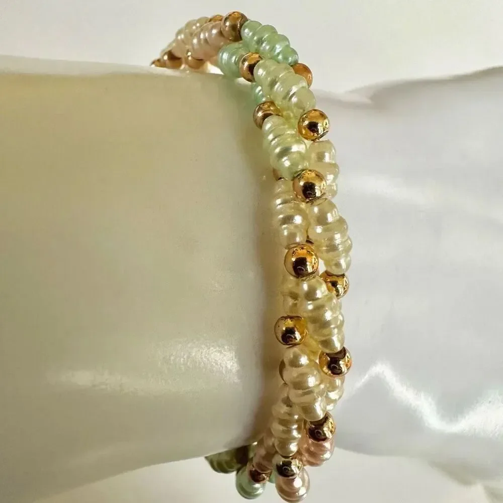 Faux pearl twisted multi strand bracelet